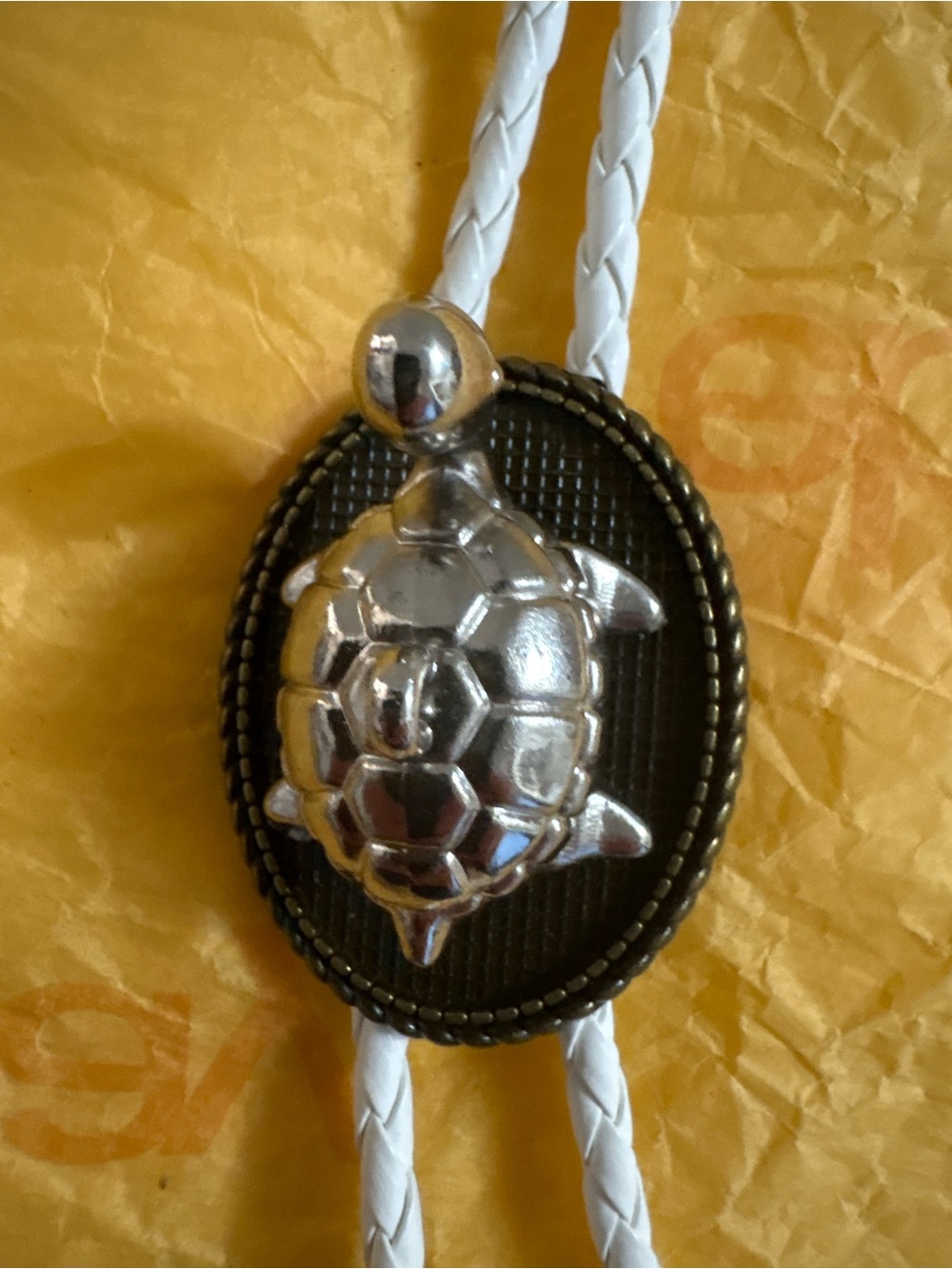 Silver Turtle Bolo Tie with White Braided Cord